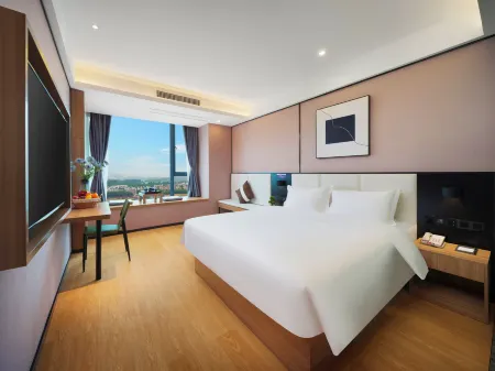 Yijia Lijing Hotel (Xipu Metro Station) Отели рядом с достопримечательностью «Shanxi Institute of Communication and Arts»