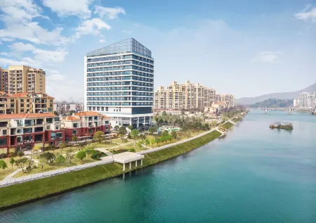 Boman Hotel Отели в г. Цзысин