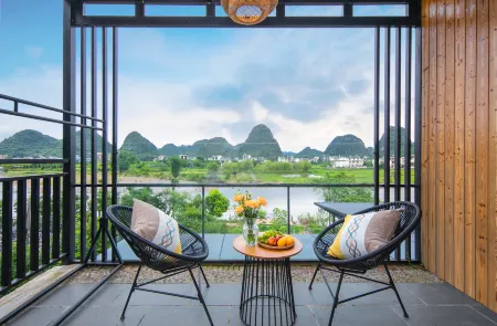 Yangshuo Shanhelian Riverside Garden Hotel Отели рядом с достопримечательностью «Yulong Bridge»