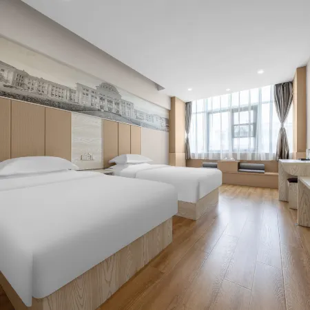 Four Seasons Arrangement Hotel (Qujing Garden Shop)