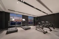 Manon Hotel Yining Border Economic Cooperation Zone Отели в г. Иньинг