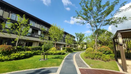 Sunshine Home Отели рядом с достопримечательностью «Shanghai International Studies University (Wenxiang Road)»