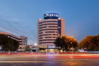 Blue Horizon Hotel  (Fuqian Street Dongcheng Dongying) Отели в г. Дуньин