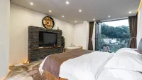 Tengchong Heshun Sufengtang Panoramic Holiday Inn Отели в г. Тенчун