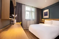 Sangel Hotel (Zhengzhou East Longhai Road Metro Station) Hotel in zona Longhai Station Waiting Hall