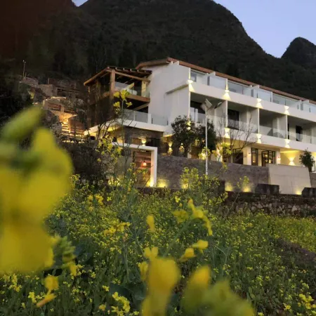 Xingyi Yunqi No.1 Inn (Xia Nahui Branch, Wanfenglin Scenic Area) Отели в г. Синъи