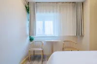Huayi Hotel Yantai University Vientiane Hui Branch Hôtels à : Yantai