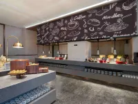Wanda Moments Hotel, Aksu Airport فنادق في أكيسوشي