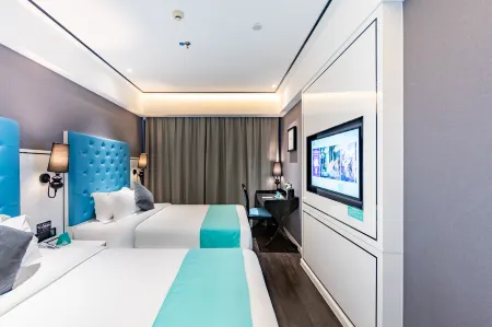 Xana Hotelle(Tengzhou Xueyuan Road store) Отели рядом с достопримечательностью «Tengzhoushi Shimin Park»