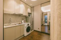 June Scenic Hotel (Wuhan Greenland International Financial City Wuchang Riverside Park)