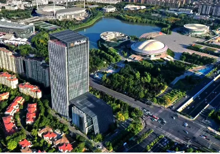 National Treasure Pury Hotel Отели рядом с достопримечательностью «Luoyang New District Gymnasium»