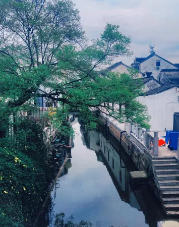 Junyi Hotel Taicang Liuhe Town Bus Station Отели рядом с достопримечательностью «Yangtze Estuary Tourist Resort in Taicang, Jiangsu Province»