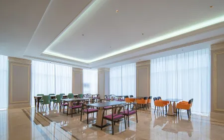 Vienna Hotel (Linyi Fortune Building) Отели в г. Линьи