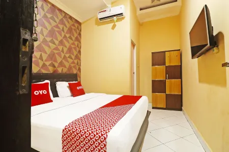 Hotel O Papi Inn Guesthouse Отели в г. Langkai