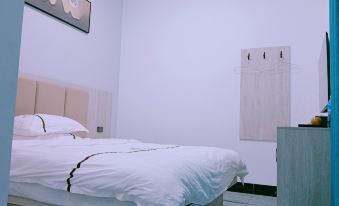 Qujing Xuanlin Ge Hotel