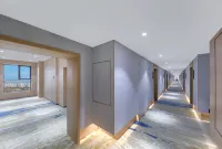 QIANNA HOTEL GLORIOUS (Zhoukou Chuanhui District High-speed Railway East Station Branch) - parking