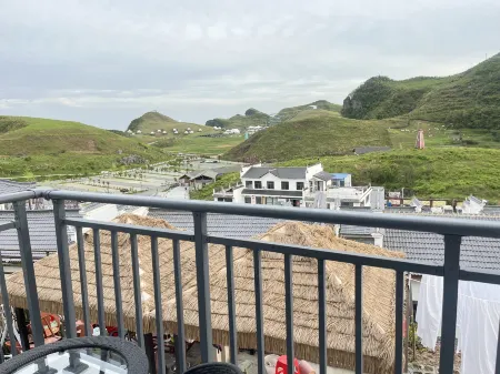 lonshanyangyangkezhan Отели рядом с достопримечательностью «Bamian Mountain»