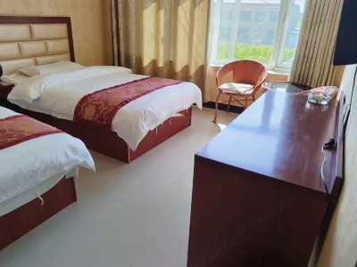 Jingbian Longwu Farmhouse Отели рядом с достопримечательностью «Longzhou Danxia Landform»