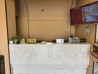 Zhouming Yuxiang Express Hotel (Suining Railway Station)