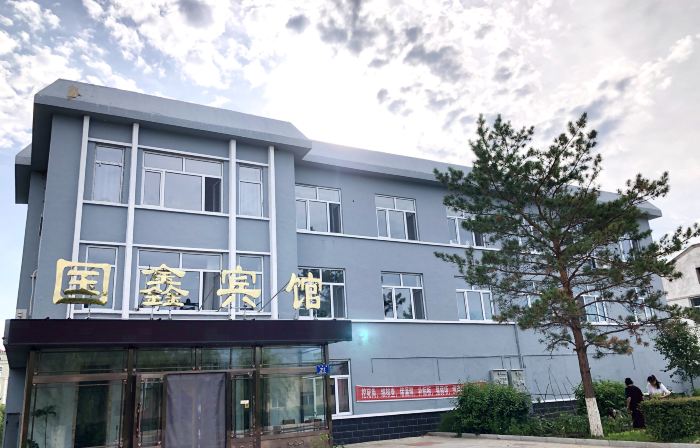 Huma Guoxin Hotel (Riverside Park)