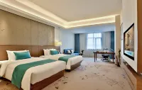 Lanxi World Trade Hotel Отели рядом с достопримечательностью «Пассажирский Центр Лэньчжэнь»