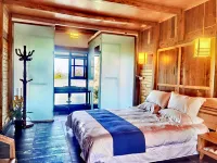 Jiangyou · Original Aspiration: Mountain Log Cabin Duplex Vacation Homestay - Kitchens
