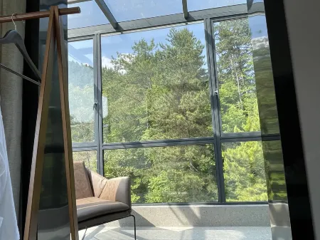 Song ping Small building Отели рядом с достопримечательностью «Baima Canyon»