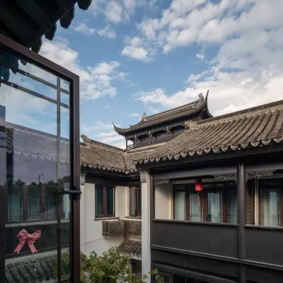 Loulan Courtyard Homestay (Suzhou Pingjiang Road Humble Administrator's Garden) Hotel in zona Museo di Suzhou