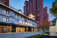 Suzhou Longdeng Yiju Life Hotel (Sucheng Shiyizhong Tongji Campus) فنادق في سوجَو