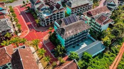 Mengla Liangqi Yunshe Business Hotel