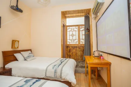 Xinyuan Inn Отели рядом с достопримечательностью «Taxia Scenic Spot, Tulou Nanjing Scenic Area»