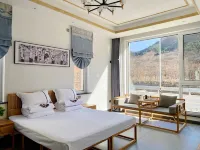 柒間伴民宿（吉姆樂園店） 鄰近天津市薊州區山知語露營地服務站的酒店