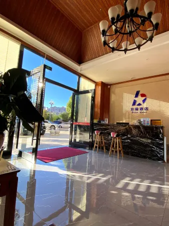 Boke Hotel (Dijingwan Branch) Отели рядом с достопримечательностью «Huangcaozhou National Wetland Park»