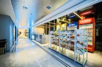 Xianghua Esports Hotel (Qiannan Normal University Wanda Plaza Branch)