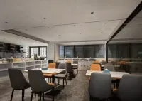 Oriental Dole Enjoyment Hotel (Oriental Culture Square High speed Railway Station Branch) Hotel a Dongfang