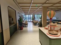 Orange Hotel (Qingdao Golden Lion Plaza Branch, Shilaoren Seawater Bathing Beach) - Balcony