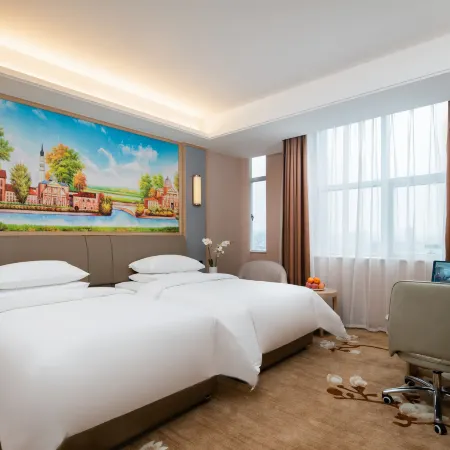 Vienna Hotel (Qujing High Speed Railway Station Wuguanyi Center)