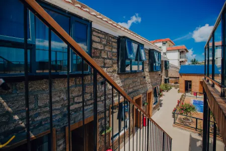 Weizhou Island Coral Residence Homestay (Catholic Church Beike Beach) Отели рядом с достопримечательностью «Wucai Beach»