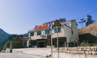 Yuexi Hualintu Restaurant Homestay