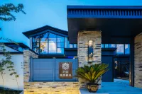 Floral Hotel·Baohua Temple Taoli spring breeze homestay فنادق في جورونغ