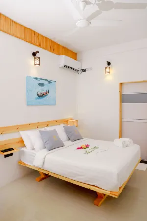Dhoani Maldives Guesthouse Отели в г. Kendhoo