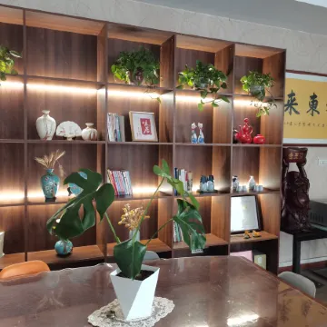 Xingping Aishang Qingshe Hotel