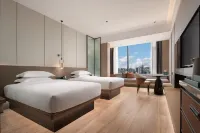 Jinnan International Hotel (HighSpeedRailCityWestStationProvincialPublicSecurity Department Store) Hotel in zona Hainan Science & Technology School