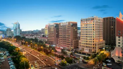 威海幸福門威高廣場桔子水晶酒店 鄰近山東省川淵堂中草葯葯用植物園的酒店