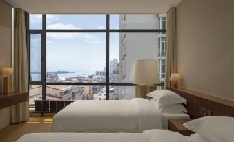 Tian Yu An Art Hotel(Dan Dong Train Station Ya Lu River Bridge) )