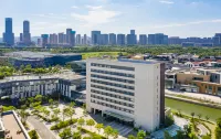 Holiday Inn Express Wuxi Taihu New City Отели в г. Уси