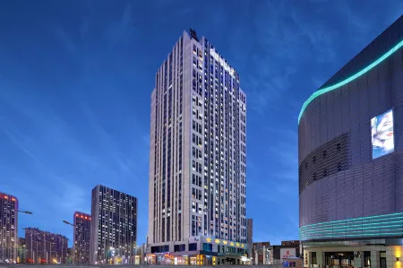 Jinjue Boutique Hotel (Harbin Haxi Wanda Plaza) Отели рядом с достопримечательностью «Heilongjiang University»