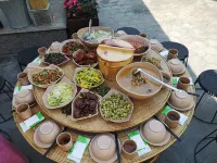 Jingmaishan Shishi Homestay - فطور