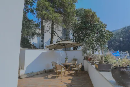 Yexu Meisu Hotel Отели рядом с достопримечательностью «The Guest-Greeting Pine»