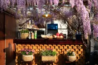 Floral Hotel·Sunshine Three Places,Cloud Sky Realm, Sunset Sunset View hotel - بار